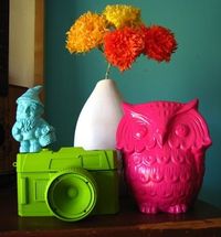 use spray paint to color dollar store kitchy decorations for a modern look